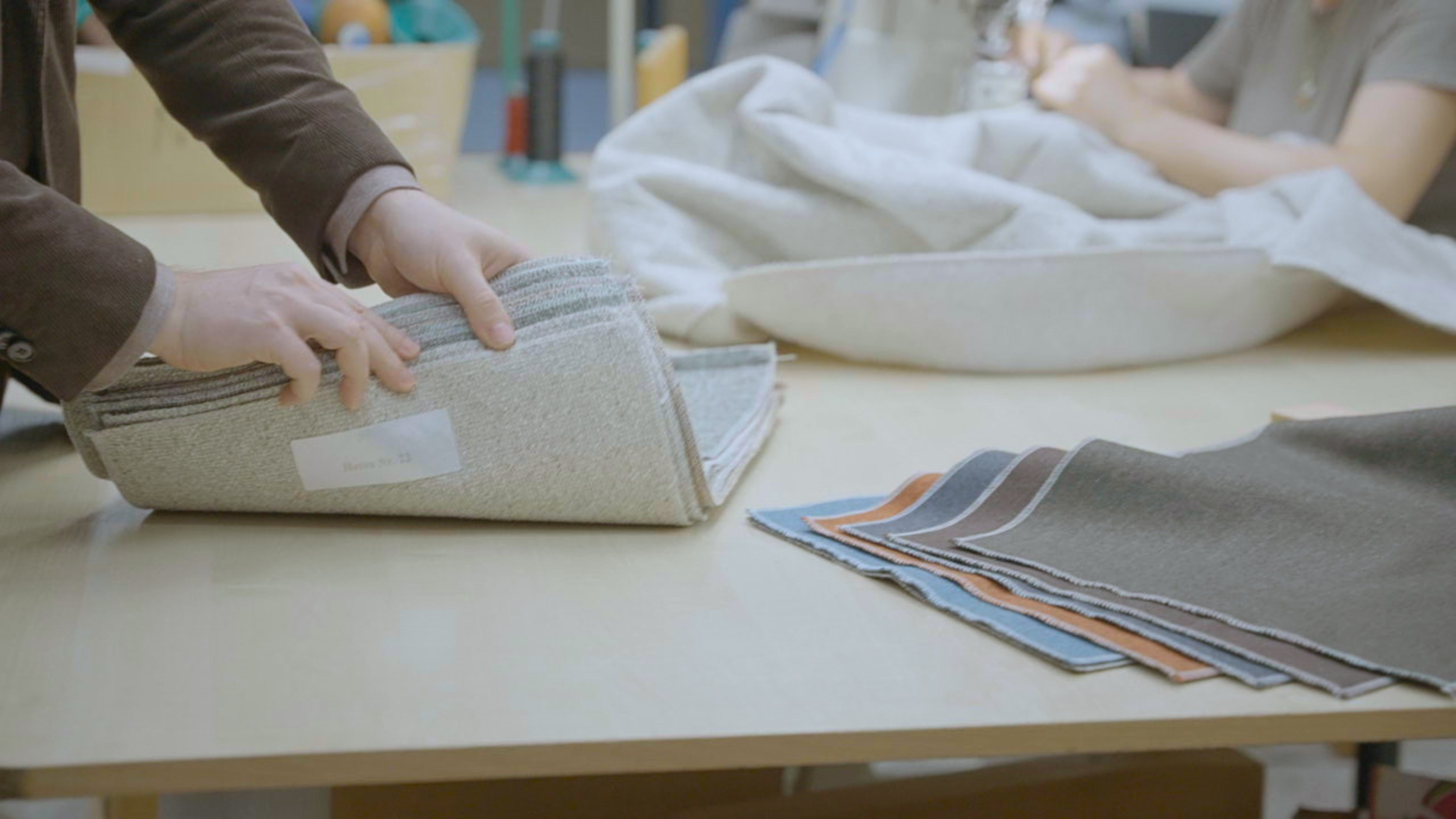 Linea-D fabric and colour samples being selected for custom furniture